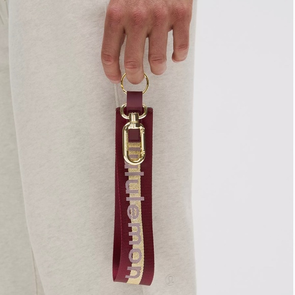 NWT  Lululemon Never Lost Keychain Wordmark in Deep Luxe/Gold/Bone - Picture 3 of 4